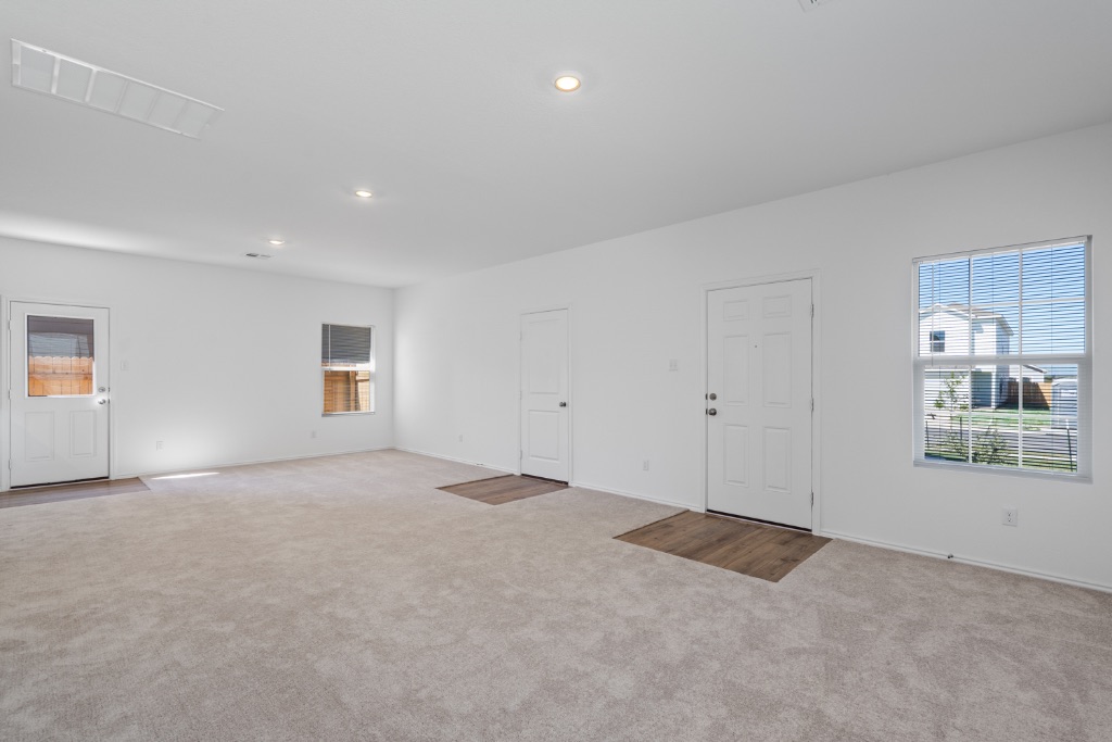 230 Gabbro Gardens Maxwell, TX 78656 - Photo 4 of 24 a view of an empty room with a window