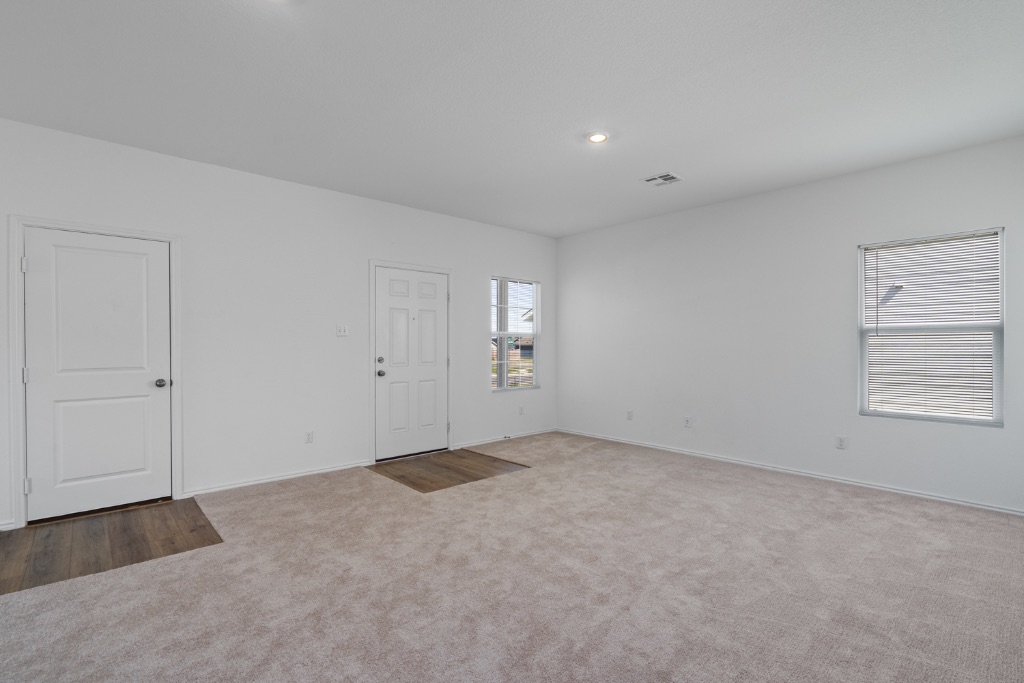 230 Gabbro Gardens Maxwell, TX 78656 - Photo 7 of 24 a view of an empty room with a window