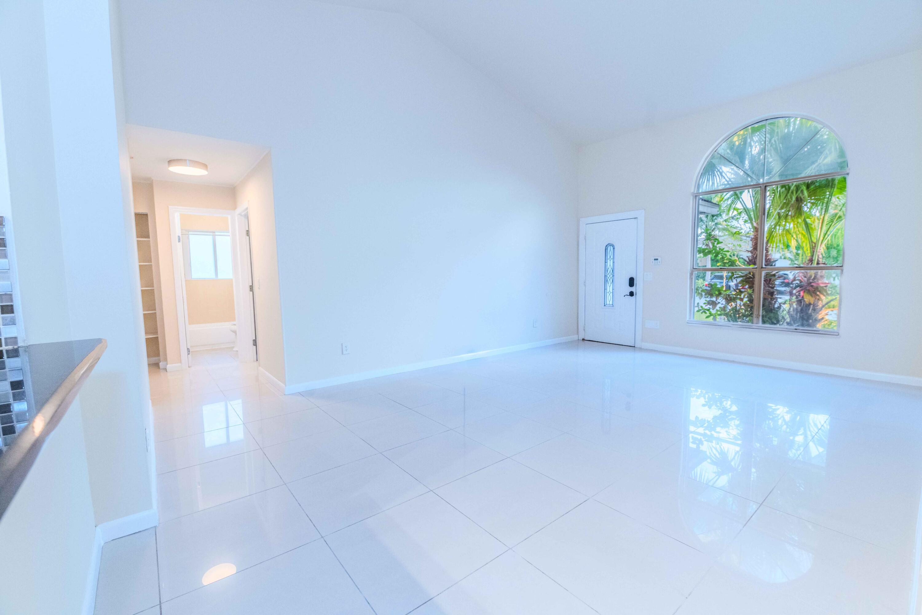 8111 Cedar Hollow Lane Boca Raton, FL 33433 - Photo 13 of 26 a view of an empty room and window