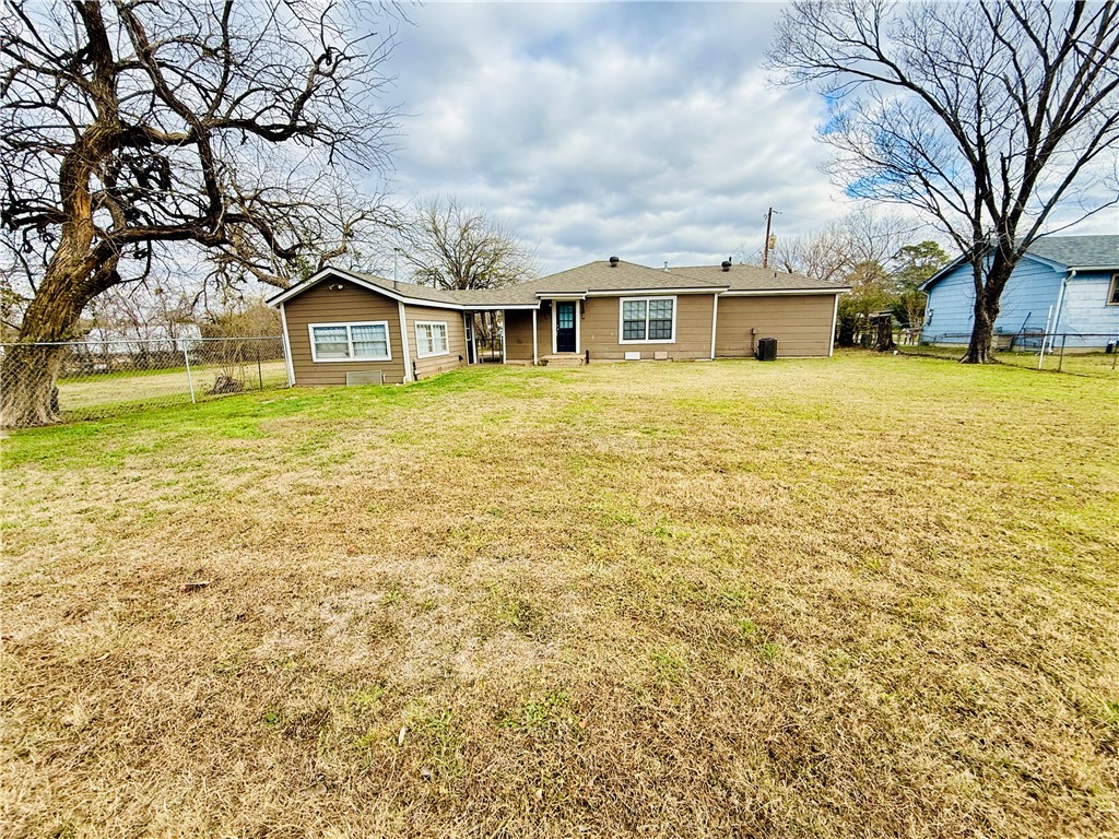 1413 Burt Street Bryan, TX 77802 - Photo 17 of 19 a front view of a house with a garden