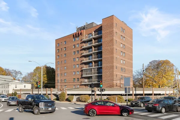 a cars parked in front of a building