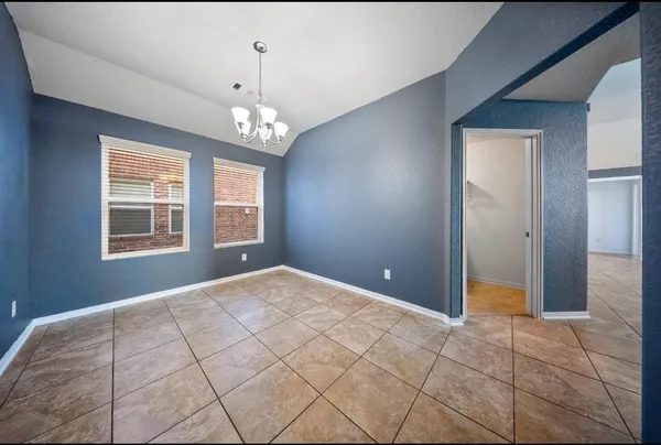 a view of an empty room with window