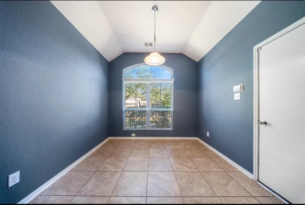 a view of entryway and hall with a window