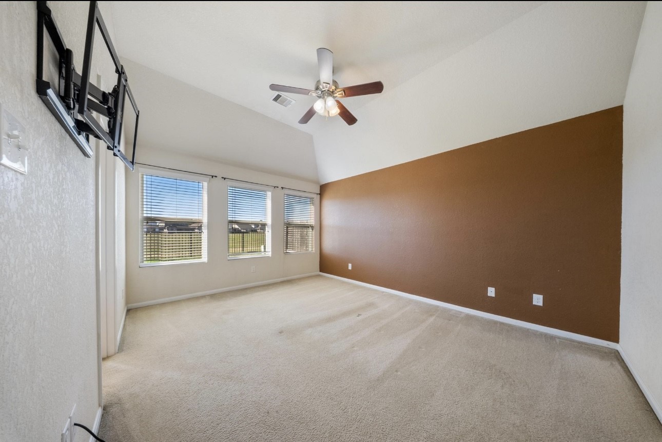 15003 Signal Ridge Way Cypress, TX 77429 - Photo 13 of 21 a view of an empty room with a window