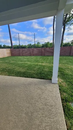a view of a yard with a big yard