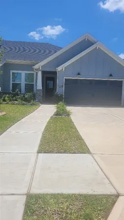a house view with a garden space