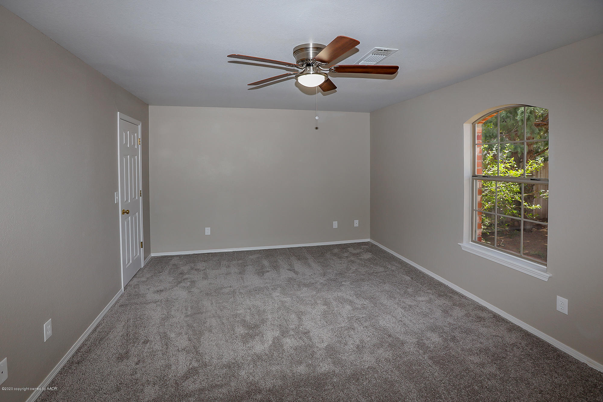 4110 South Hayden Street Amarillo, TX 79110 - Photo 13 of 28 a view of an empty room with a window