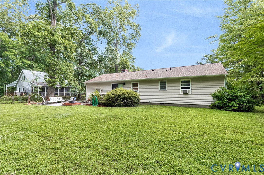 635 River Oaks Road Center Cross, VA 22437 - Photo 41 of 63 Spacious green lawn with mature trees and a detach