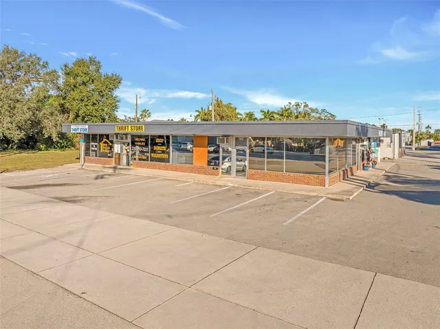 a view of a swimming pool with a lounge chairs