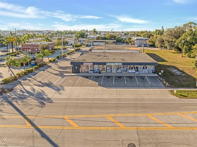 a view of a swimming pool with a lounge chair