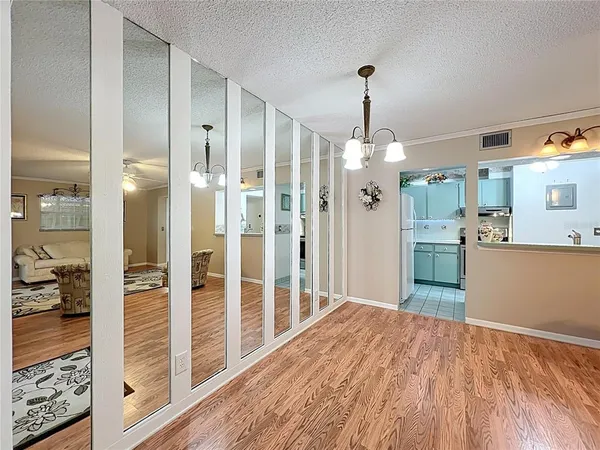 a kitchen with a sink cabinets and window