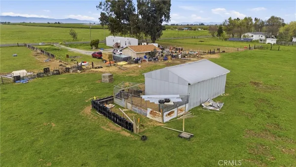 an aerial view of a house with garden