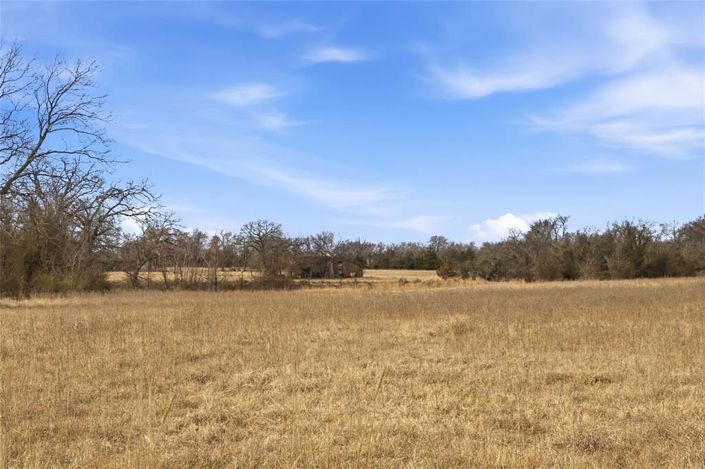 742 County Road 1144 Point, TX 75472 - Photo 27 of 28 a view of lake with sunset in background