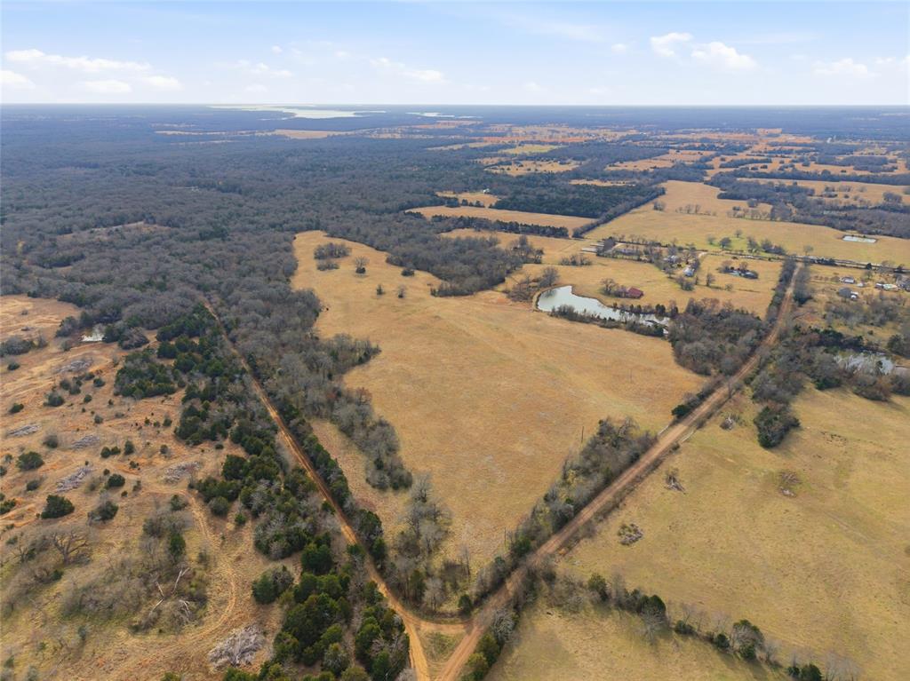 742 County Road 1144 Point, TX 75472 - Photo 6 of 28 an aerial view of residential houses with outdoor space