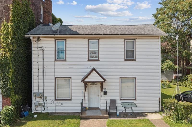 322 North 4th Street Apollo, PA 15613 - Photo 2 of 11 a front view of a house with a yard