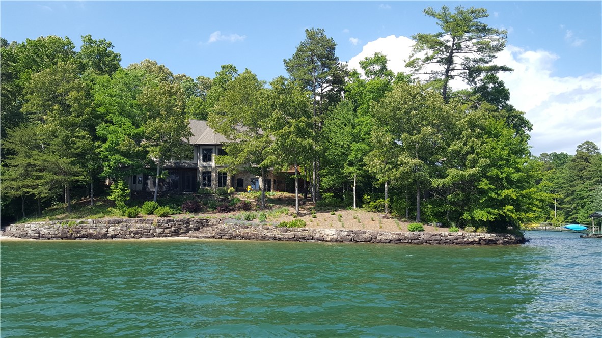 214 Wild Ginger Way Sunset, SC 29685 - Photo 1 of 49 Stacked stone boulder shore protection, 2 beach ar