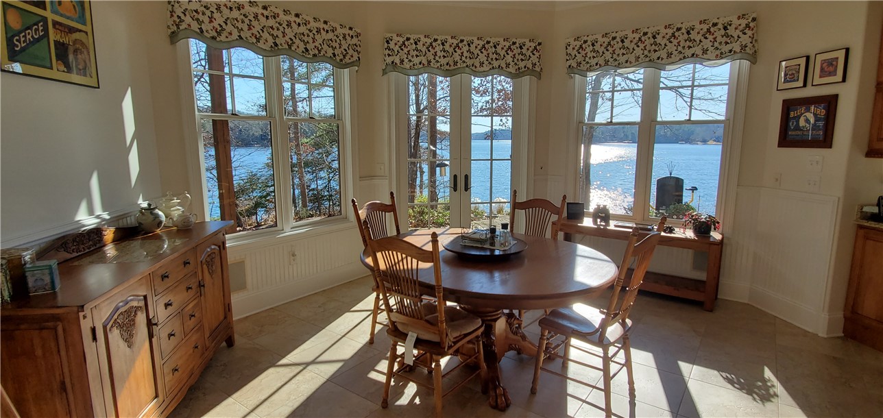 214 Wild Ginger Way Sunset, SC 29685 - Photo 11 of 49 French Doors to lakeside patio. Kitchen is on lake