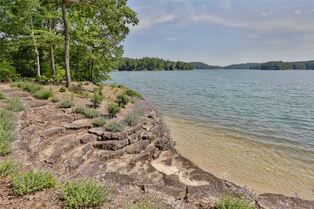 214 Wild Ginger Way Sunset, SC 29685 - Photo 14 of 49 Stacked Stone seawall and steps