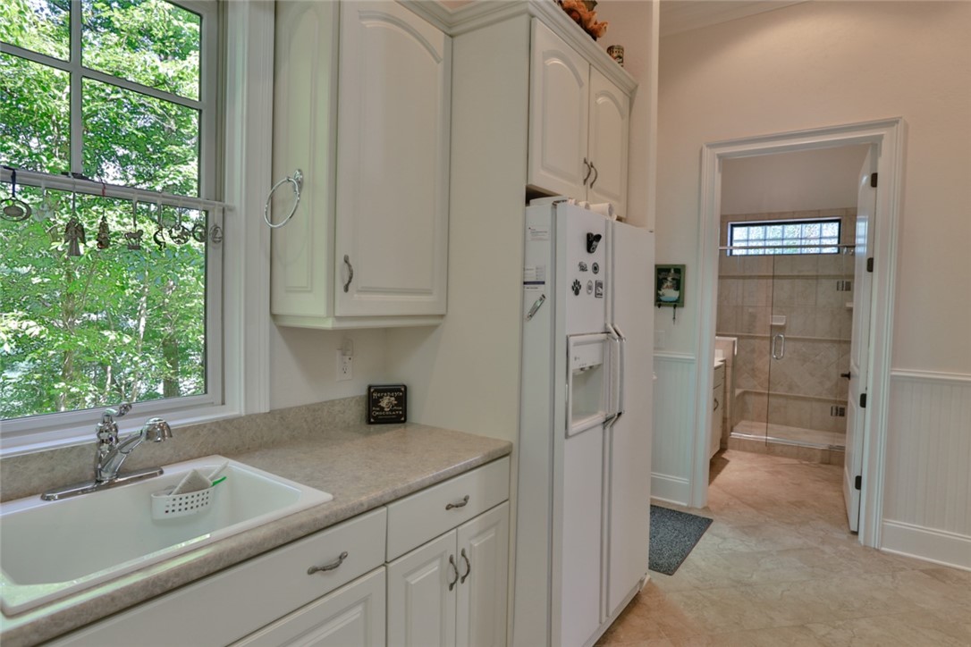 214 Wild Ginger Way Sunset, SC 29685 - Photo 34 of 49 Laundry and bath just off kitchen