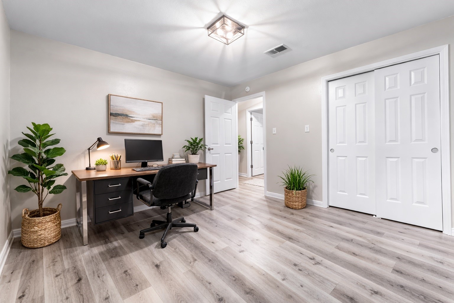 209 Summit Drive Conroe, TX 77303 - Photo 11 of 21 a workspace with furniture and wooden floor