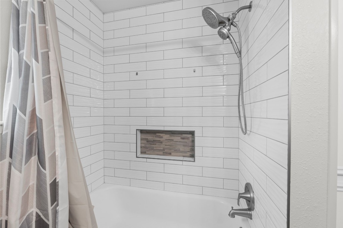 209 Summit Drive Conroe, TX 77303 - Photo 14 of 21 a bathroom with a shower