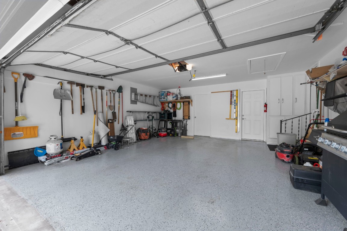 209 Summit Drive Conroe, TX 77303 - Photo 17 of 21 a view of a storage area with shoes and chairs