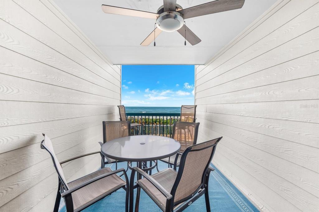 102 68th Street, Unit 102 Holmes Beach, FL 34217 - Photo 28 of 48 a view of a dining room with furniture
