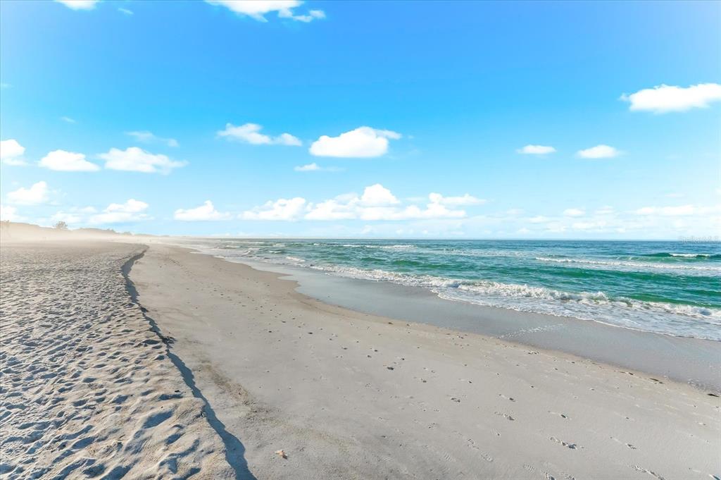 102 68th Street, Unit 102 Holmes Beach, FL 34217 - Photo 36 of 48 a view of a beach with ocean view