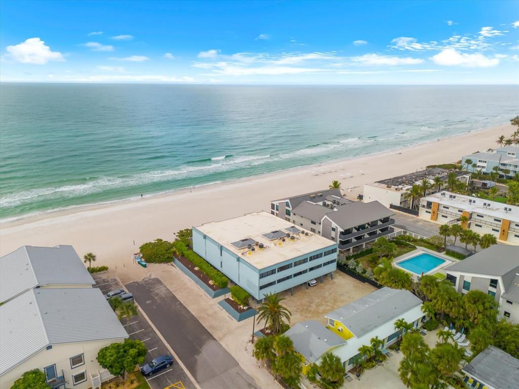 102 68th Street, Unit 102 Holmes Beach, FL 34217 - Photo 46 of 48 a view of a city with an ocean view