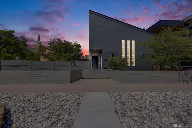 a view of a backyard of the house