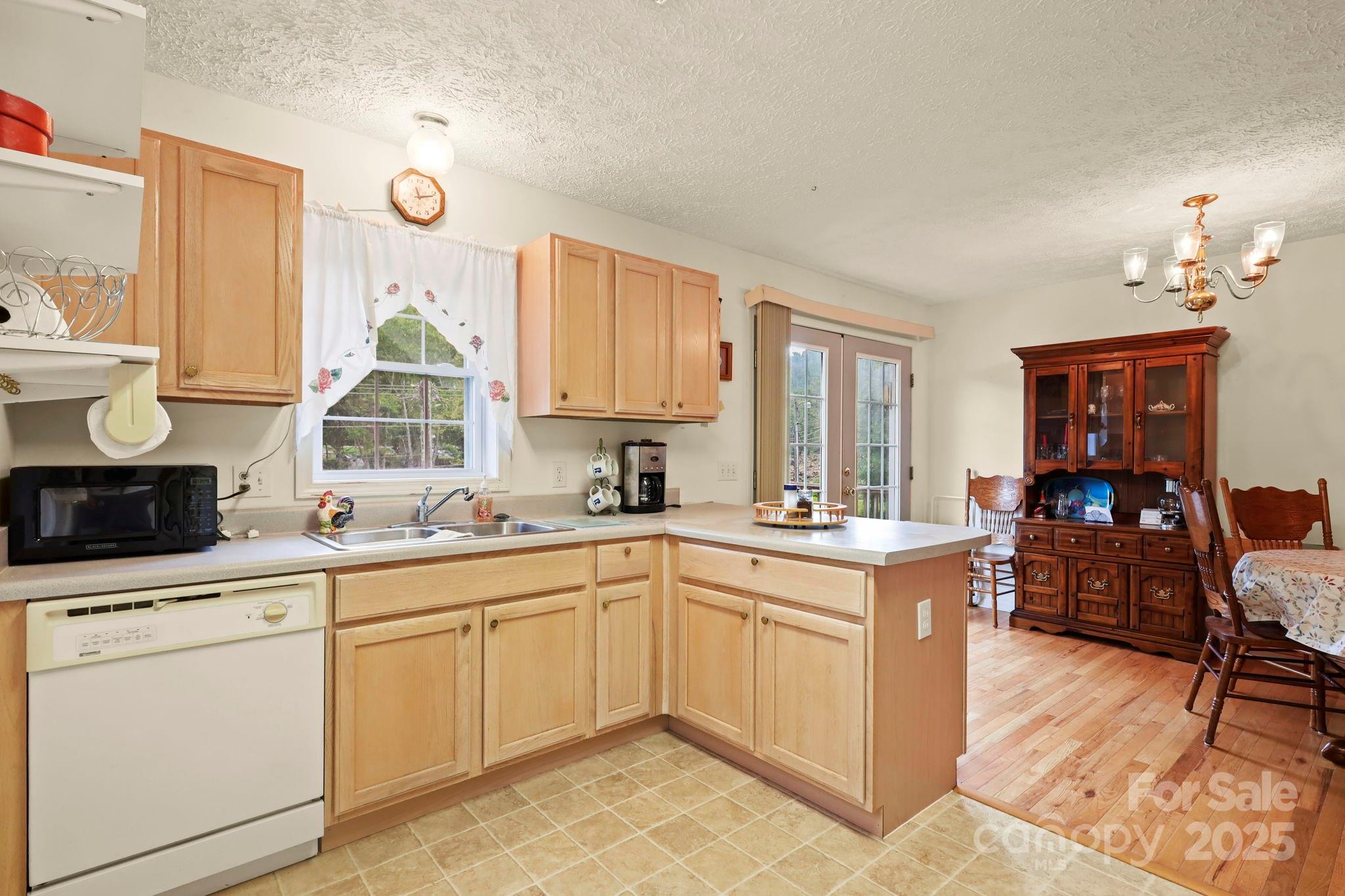 31 Barlow Road Elk Park, NC 28622 - Photo 15 of 40 a kitchen with a sink and cabinets