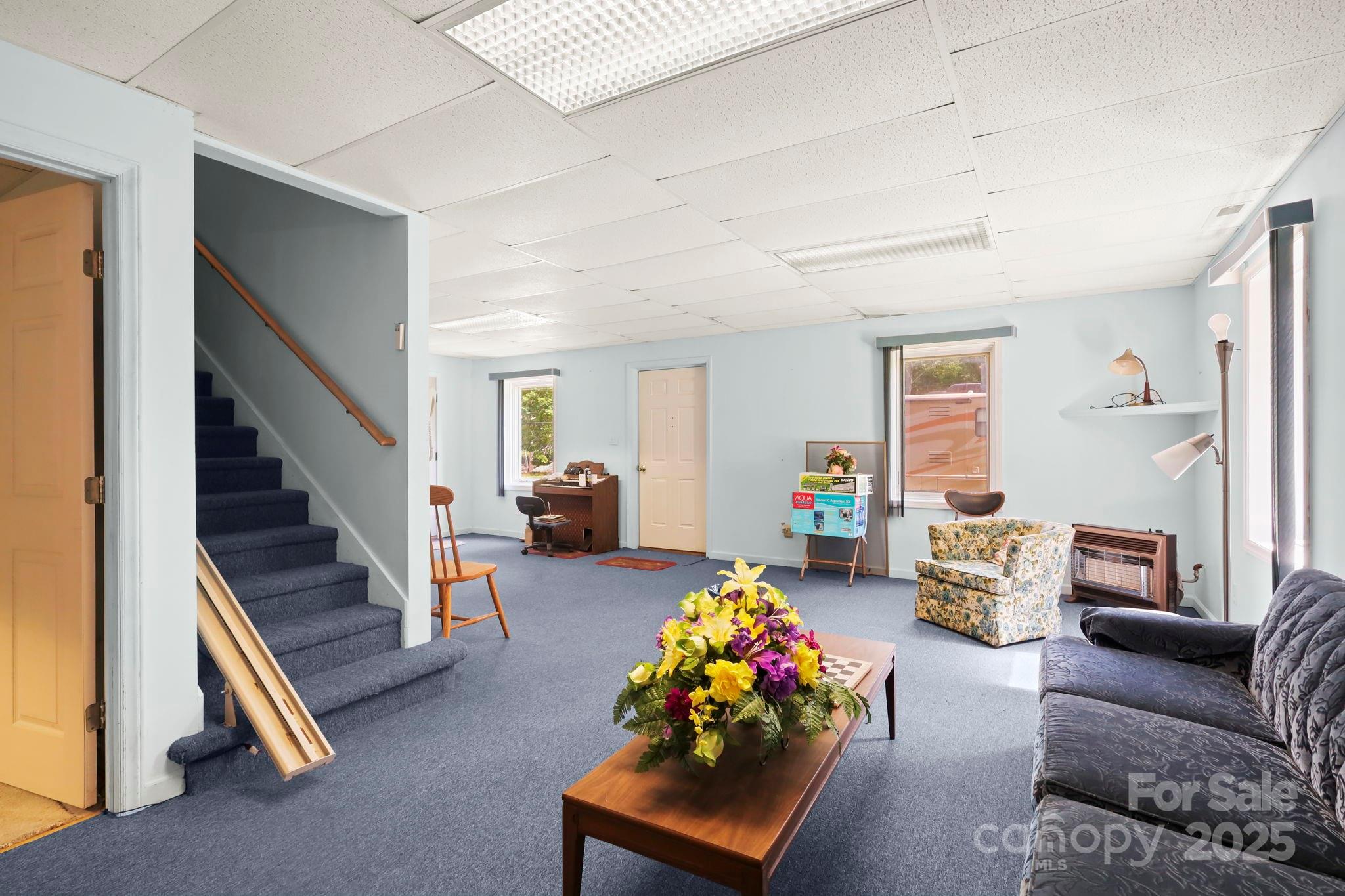 31 Barlow Road Elk Park, NC 28622 - Photo 28 of 40 a living room with furniture and a couch