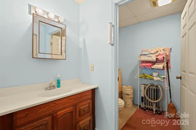 a bathroom with a shower and a bath tub