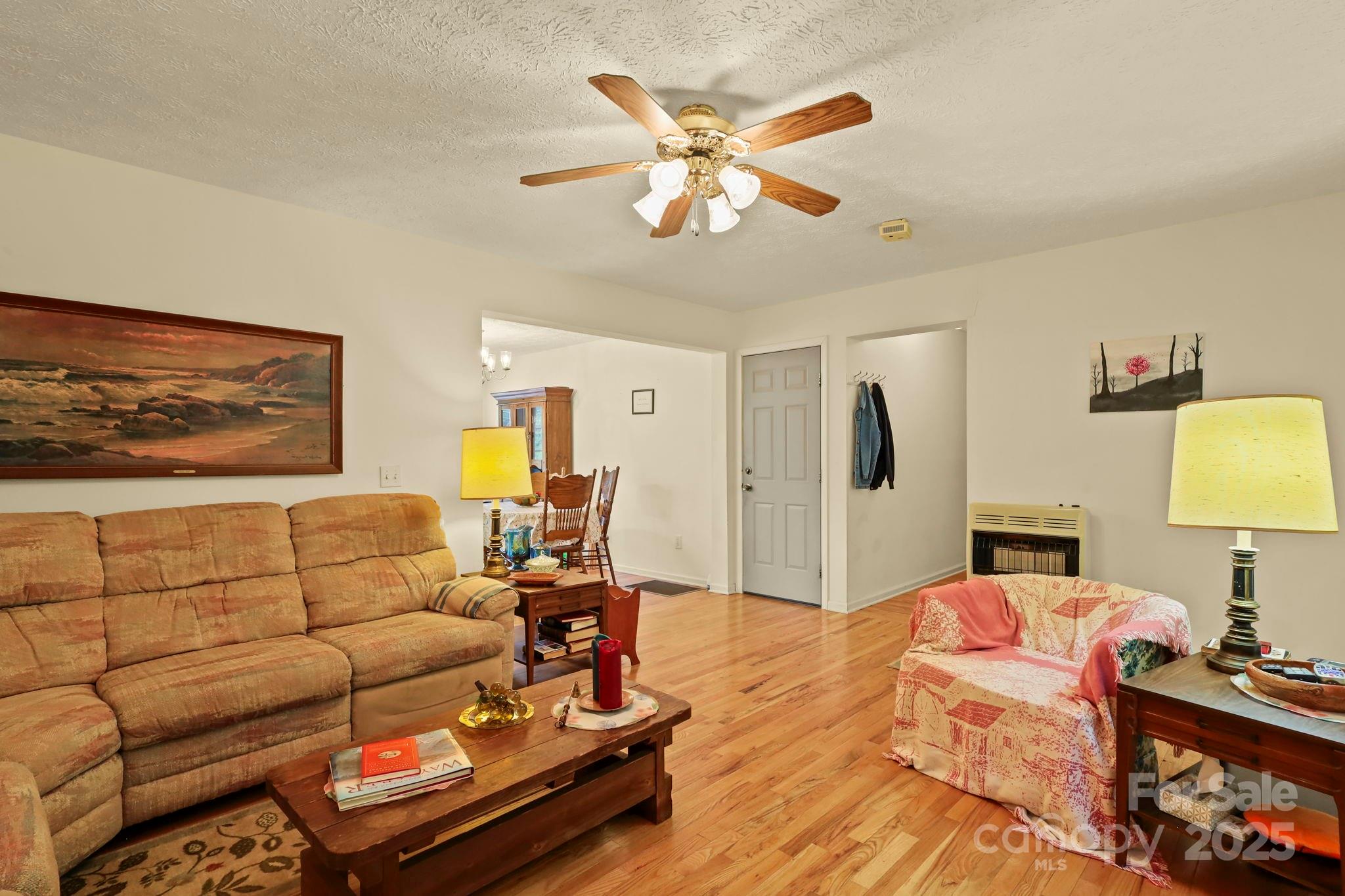 31 Barlow Road Elk Park, NC 28622 - Photo 9 of 40 a living room with furniture and a flat screen tv