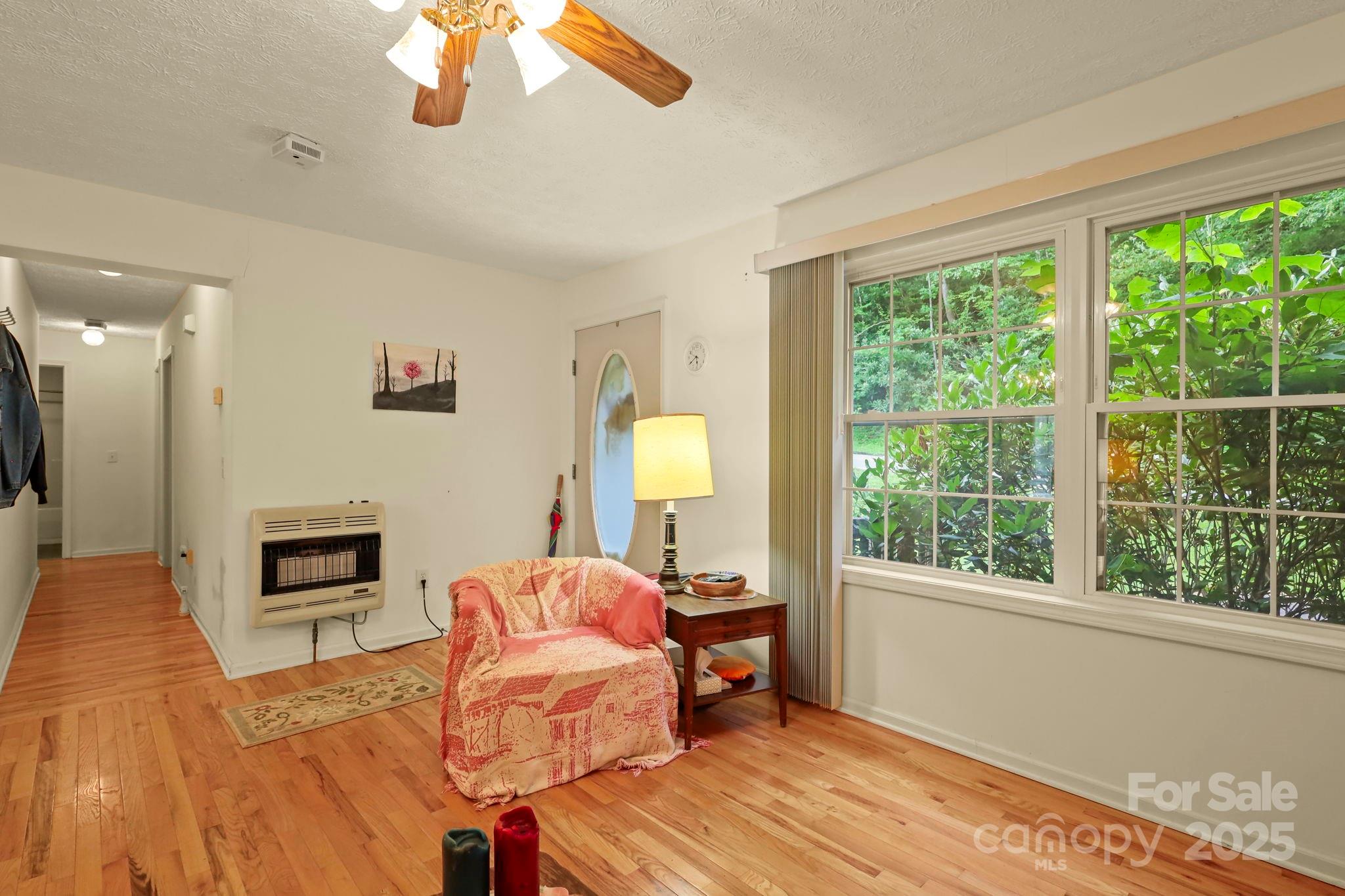 31 Barlow Road Elk Park, NC 28622 - Photo 10 of 40 a bedroom with a bed and a window