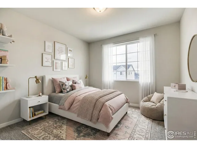 a bathroom with a double vanity sink toilet mirror and shower