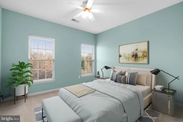 a bedroom with bed and a window