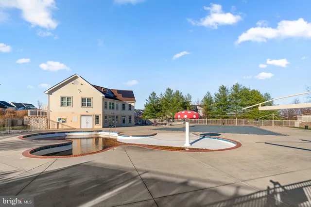 a view of a house with entertaining space and a car park view