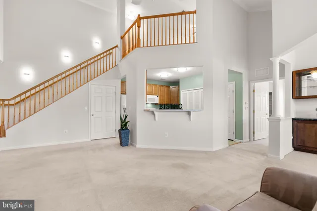 a view of livingroom with furniture and staircase