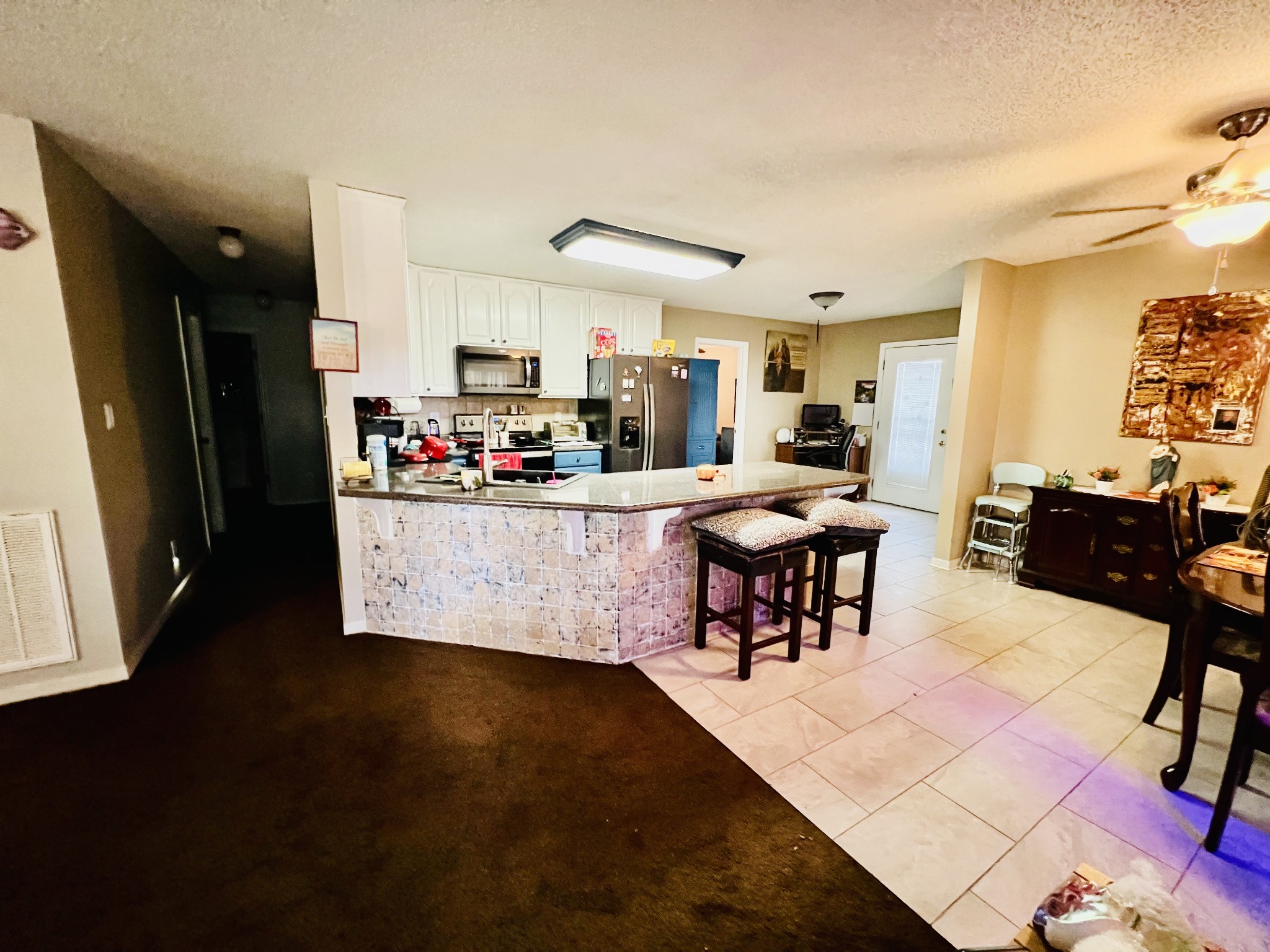 106 Wells Lee Road Elora, TN 37328 - Photo 11 of 33 Beautiful tile floors in kitchen/dining for easy clean-up.