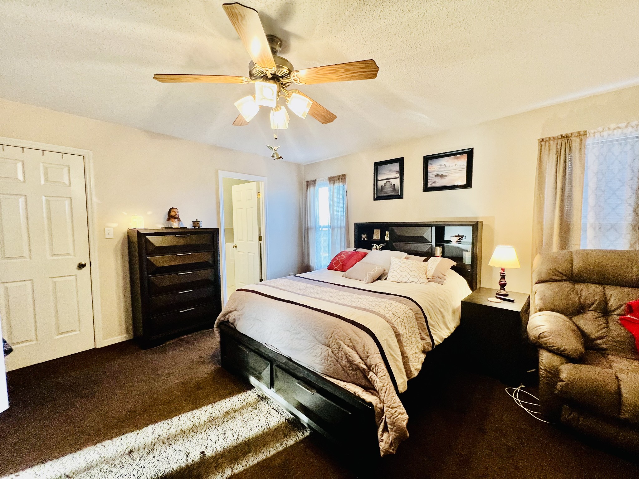 106 Wells Lee Road Elora, TN 37328 - Photo 14 of 33 Primary bedroom has a walk-in closet, ceiling fan and its own bath.
