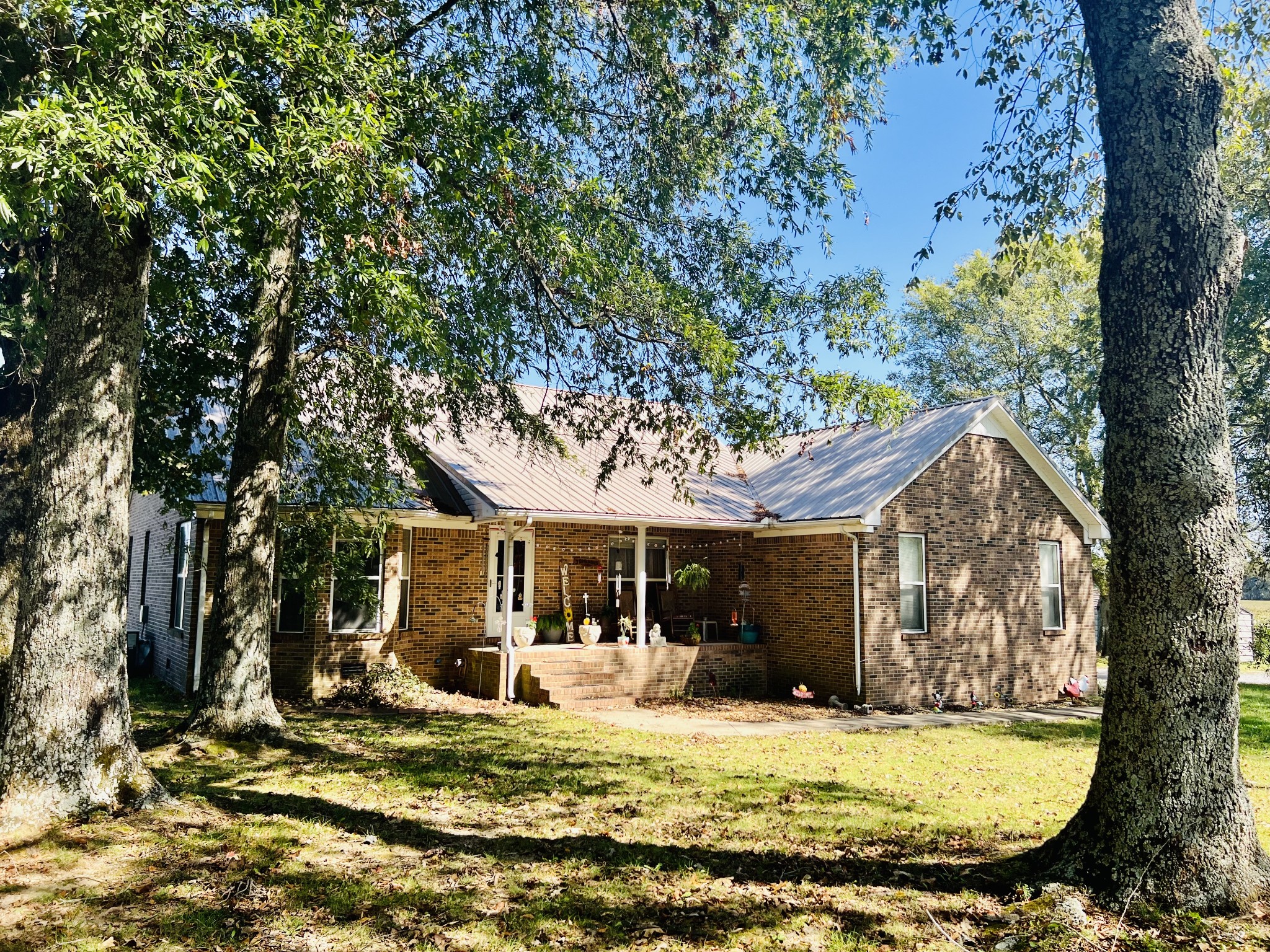 106 Wells Lee Road Elora, TN 37328 - Photo 21 of 33 Beautiful dappled shade from the large trees in the yard