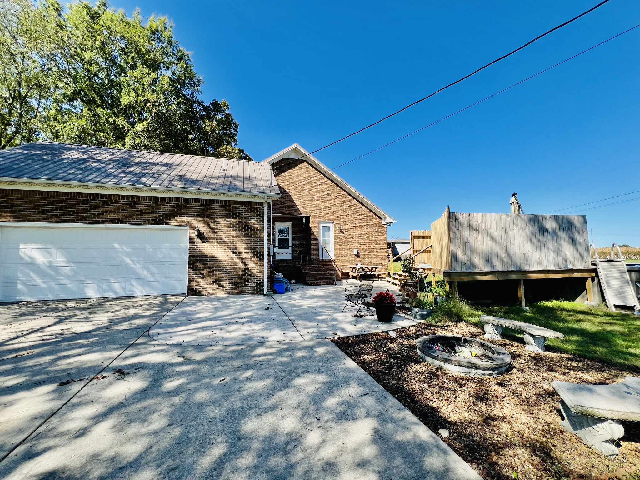 106 Wells Lee Road Elora, TN 37328 - Photo 24 of 33 An above ground pool with privacy fence and a firepit will make outdoor living enjoyable.