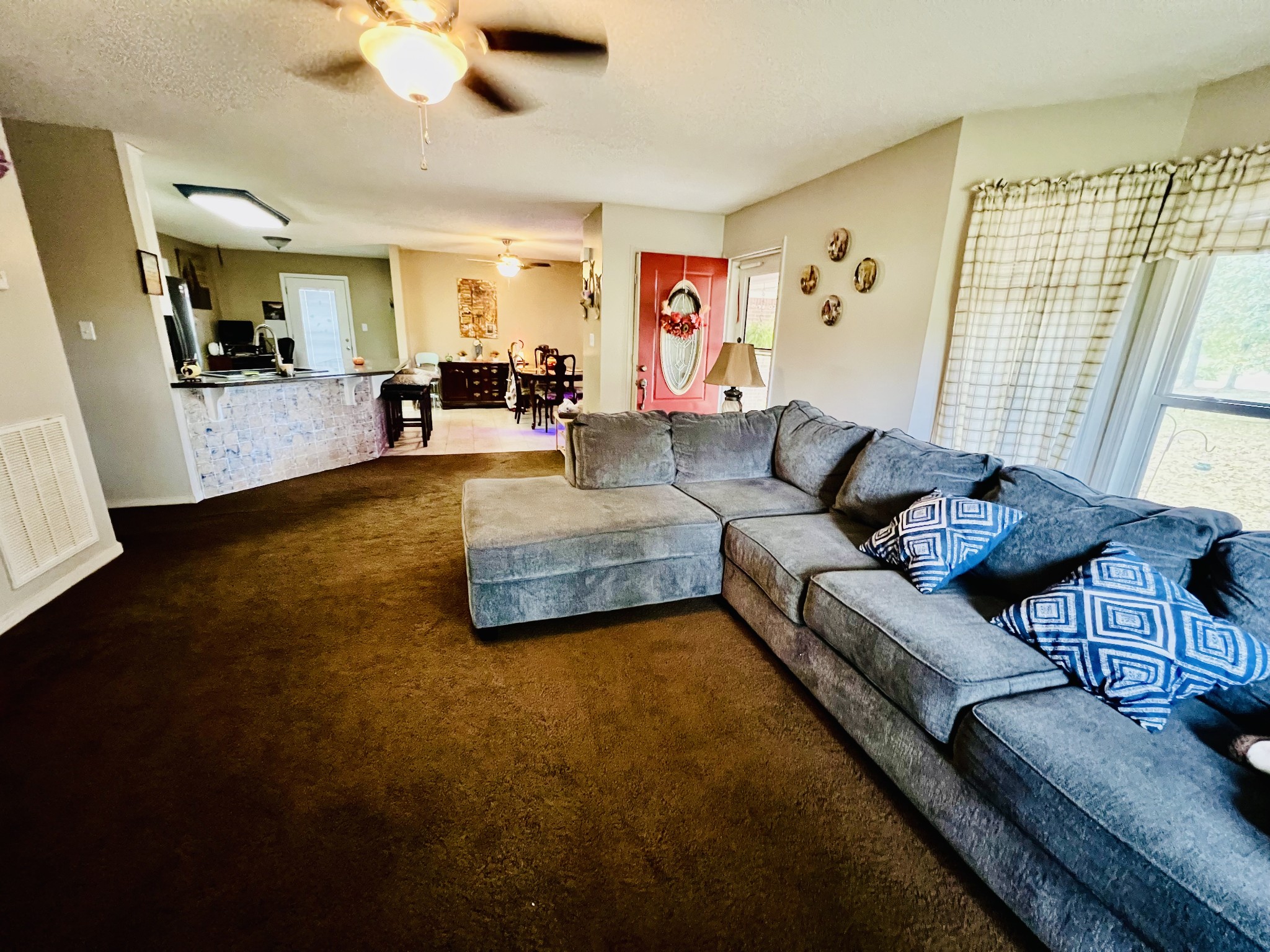 Living area is open to the dining and kitchen areas for spacious living.