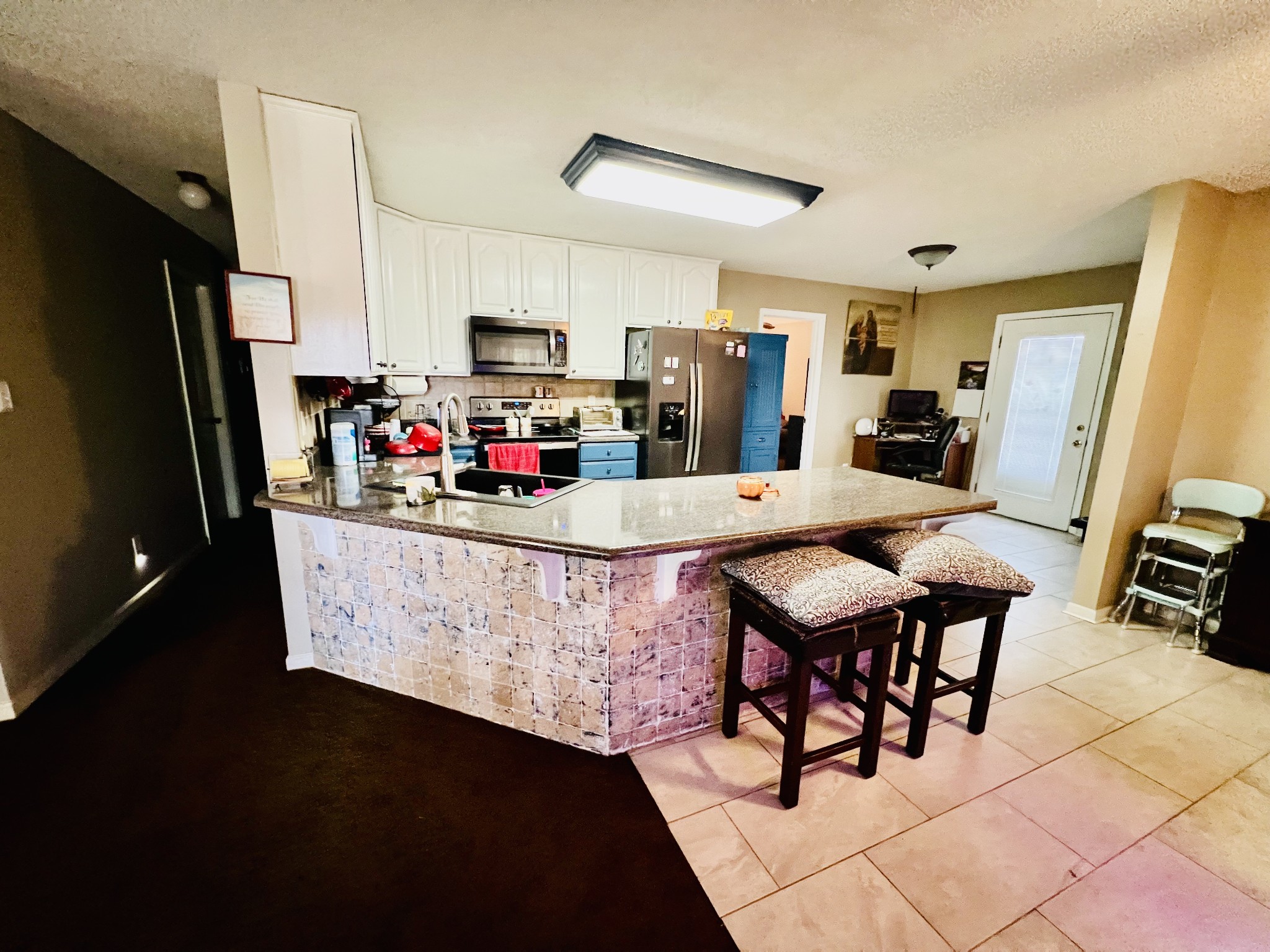 106 Wells Lee Road Elora, TN 37328 - Photo 10 of 33 Kitchen has an additional countertop area for eating, lots of cabinetry and all appliances are included.