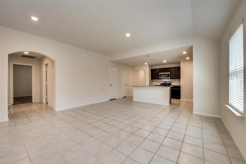 809 Costlow Lane Fate, TX 75189 - Photo 11 of 29 a view of a kitchen with furniture and a window