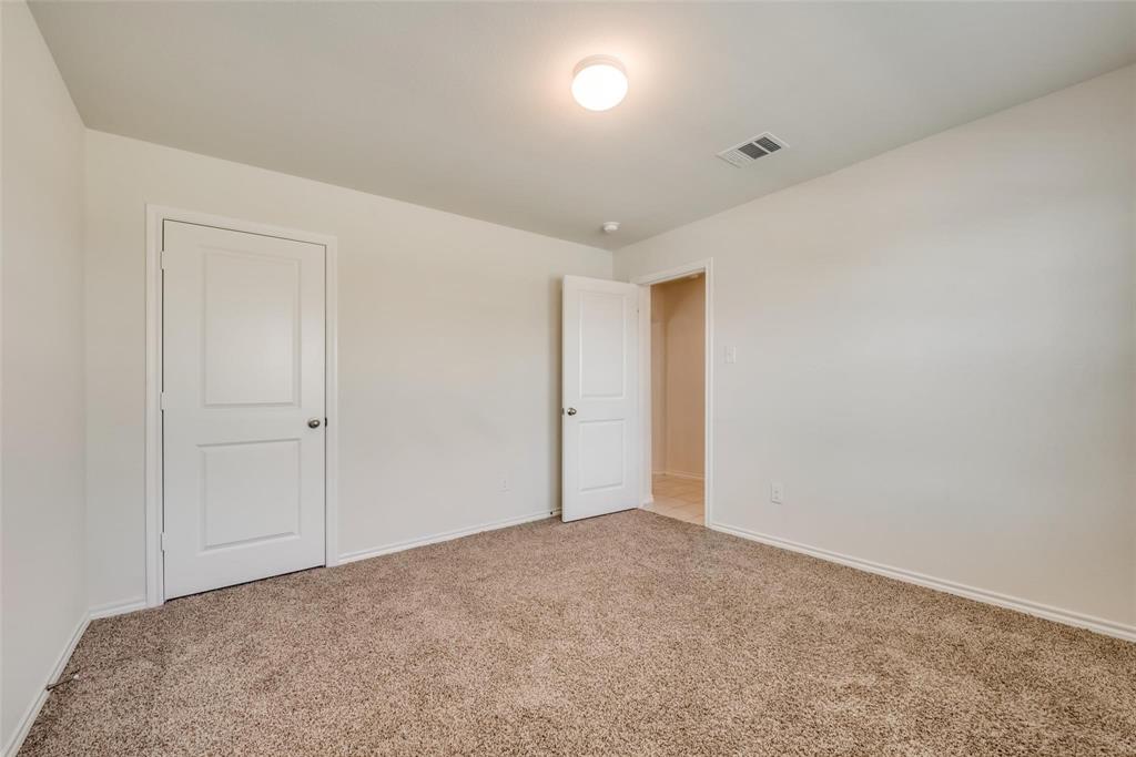 809 Costlow Lane Fate, TX 75189 - Photo 18 of 29 a view of an empty room