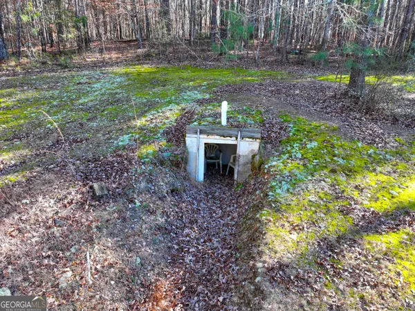 a view of a big yard with green space