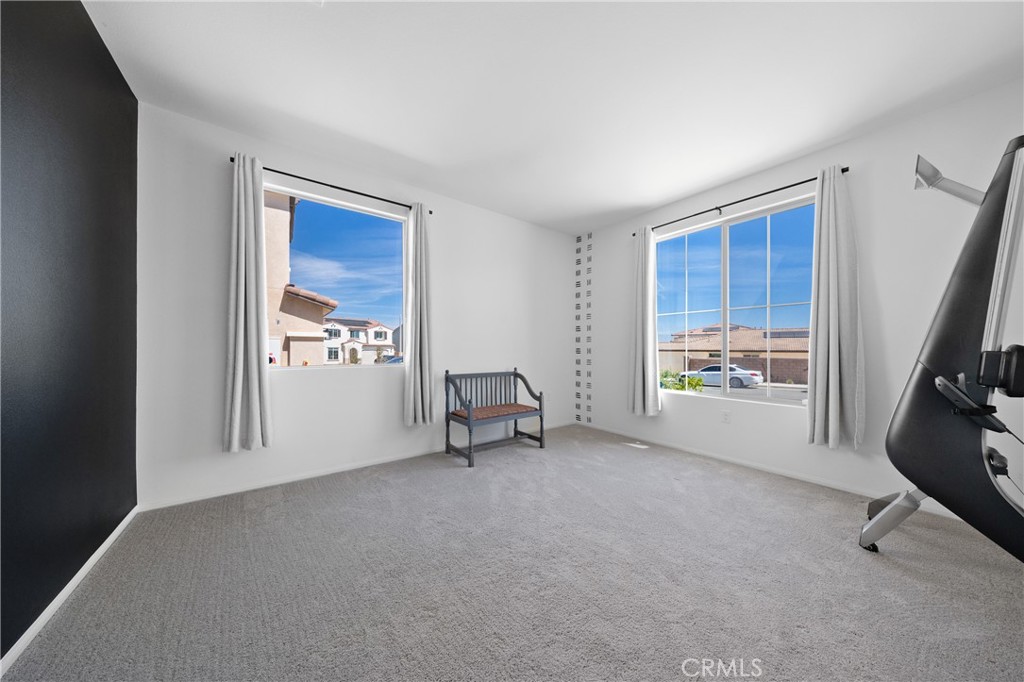 27059 Indigo Bush Road Menifee, CA 92586 - Photo 12 of 39 Front Room Near Entry – Ideal For Office, Sitting Area, Or Flex Space