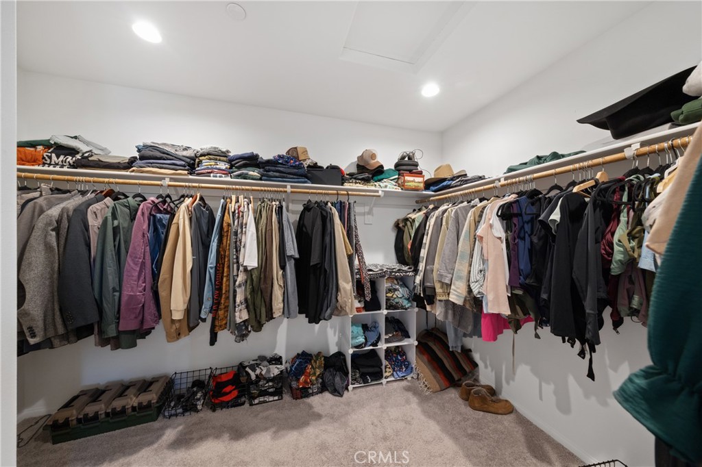 27059 Indigo Bush Road Menifee, CA 92586 - Photo 17 of 39 Walk-In Closet With Built-In Organization And Ample Storage Space